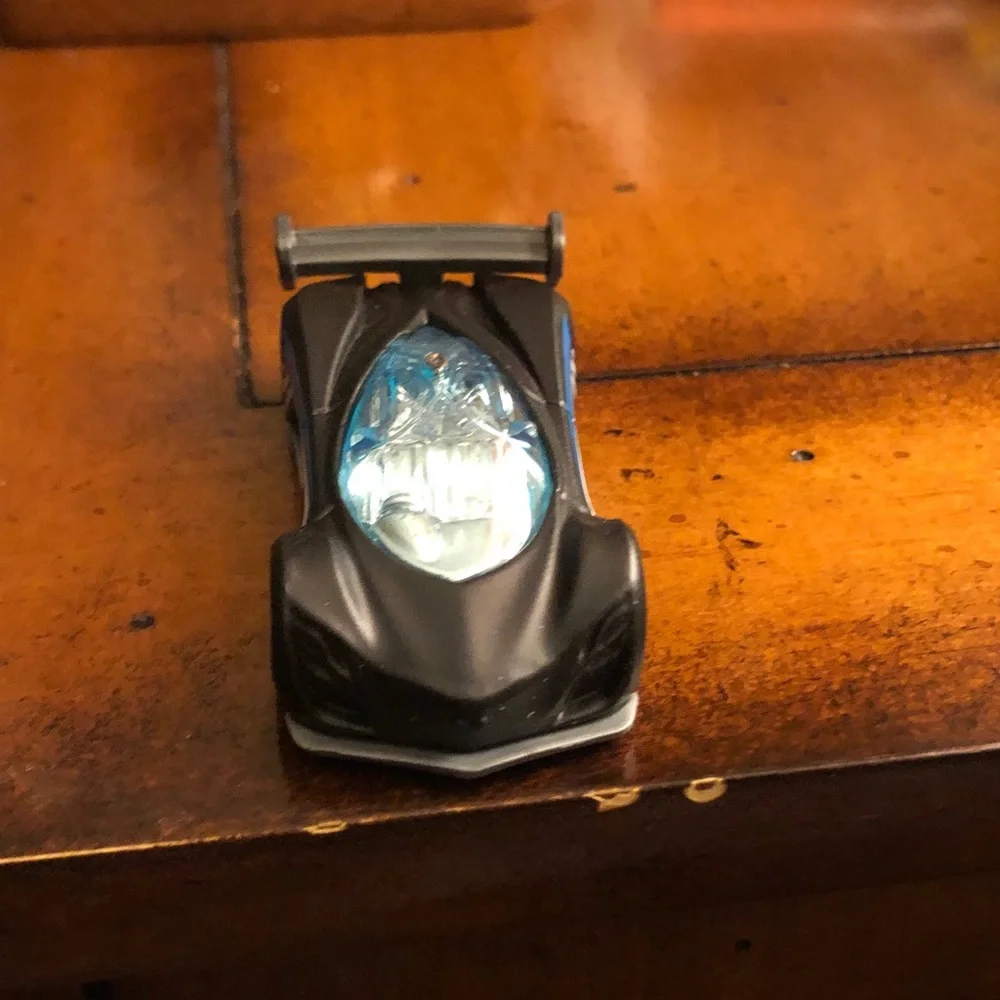 Black Toy Race Car with Blue Windshield